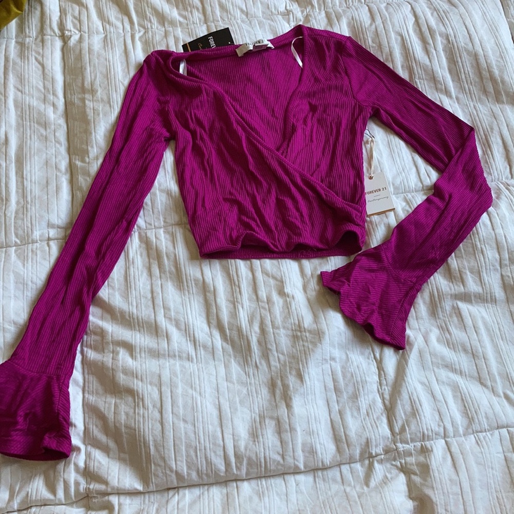 Ribbed wrap crop top with bell sleeves in rich fuchsia color size small